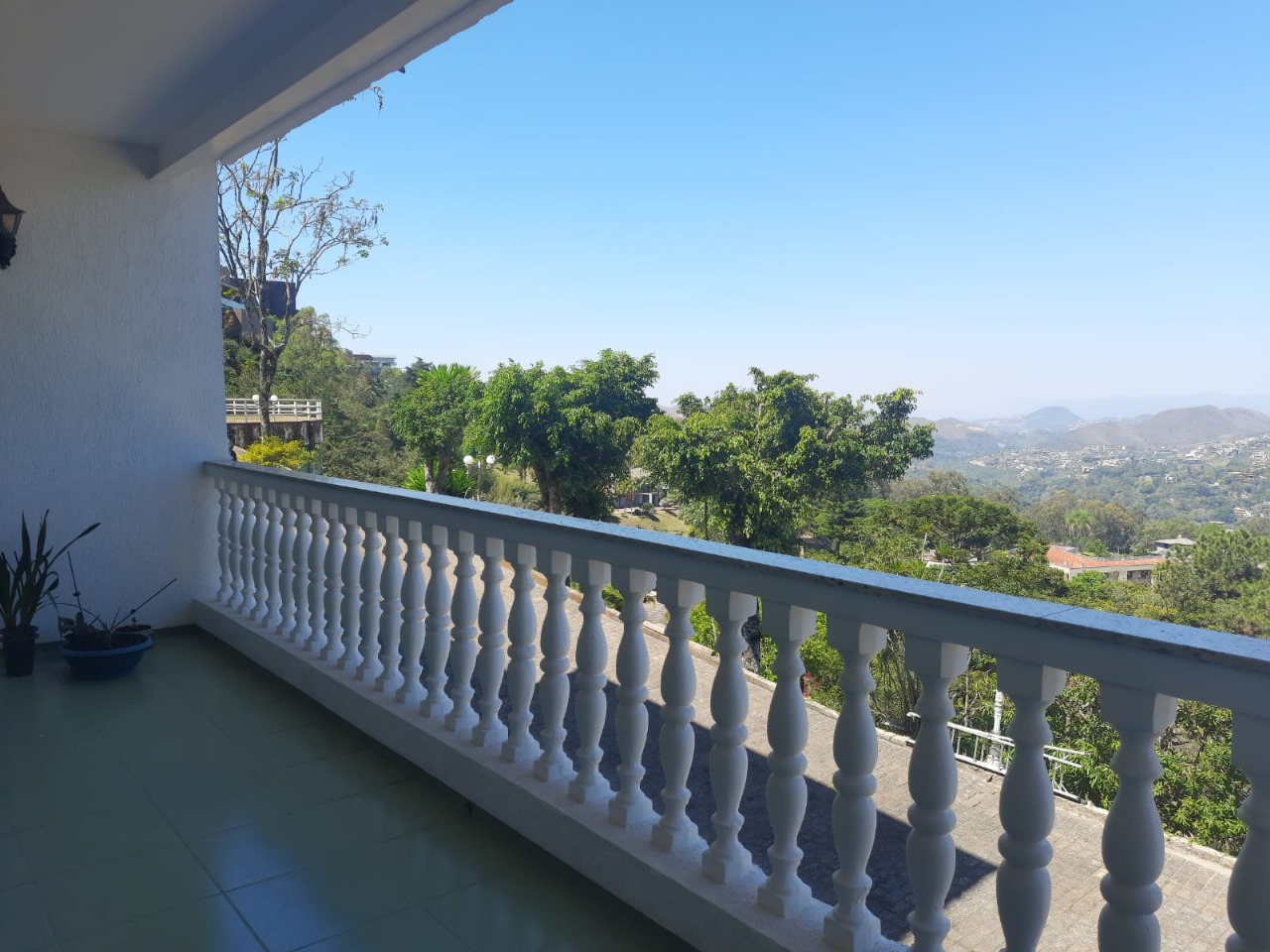 CasaNL-VistaExternaVarandaLateral